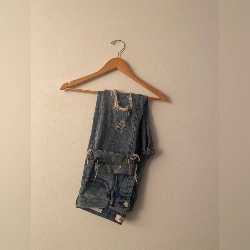 Destroyed jeans with patches